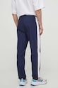 Odzież Fila spodnie dresowe Luoyang FAM0659 granatowy