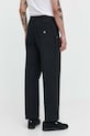 Odzież Converse spodnie bawełniane 10026010.A02 czarny