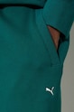 Puma spodnie dresowe bawełniane MMQ Sweatpants turkusowy 624007