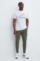 Under Armour spodnie dresowe 1382134 zielony SS24