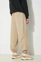 Abbigliamento New Balance pantaloni da jogging in cotone MP41508SOT beige