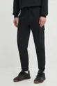 czarny New Balance spodnie dresowe MP41553BK Męski