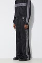 AMBUSH spodnie dresowe Track Pants czarny BMCJ003S24JER0011009