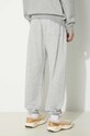 Odjeća Donji dio trenirke New Balance Sport Essentials MP41519AG siva