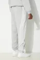 New Balance spodnie dresowe Hoops Materiał 1: 65 % Bawełna, 35 % Poliester, Materiał 2: 100 % Poliamid z recyklingu