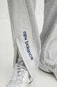 Tepláky New Balance Hoops šedá MP41582AGT