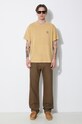 Хлопковые брюки Filson Dry Tin 5 Pocket Pant FMPAN0012 зелёный SS24