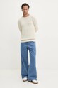 Бавовняний светр Tommy Jeans DM0DM18370 бежевий NC24