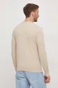 Ένα πουλόβερ σε μείγμα μεταξιού Guess 60% Βαμβάκι, 35% Πολυαμίδη, 5% Μετάξι