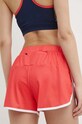 Odzież Fila szorty do biegania Ruffec FAW0718 pomarańczowy