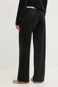 Одежда Пижамные брюки Juicy Couture VICKY RIB FLARE PANT JCLAS125504 чёрный