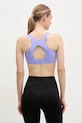 Одежда Спортивный бюстгальтер Calvin Klein Performance LVGWS5K123 фиолетовой