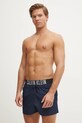Plavkové šortky Calvin Klein KM0KM01094 tmavomodrá SS25