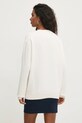 Ρούχα Μπλούζα Tommy Jeans DW0DW20172 μπεζ