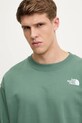 The North Face bluza bawełniana Nuptse Oversized zielony NF0A8C3UHCH1