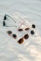 Dětské sluneční brýle Liewood Darla Sunglasses 1-3 Y bílá LW20088