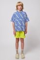 Bobo Choses polo bawełniane dziecięce Wavy wzorzyste niebieski 125AC018