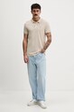 Tommy Jeans polo bawełniane DM0DM20676 beżowy NC25