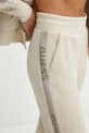 Guess pantaloni de trening VICTOIRE bej W5RB00.KBYE2