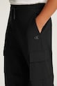 Дитячі спортивні штани Calvin Klein Jeans DRY KNIT SKATER IB0IB02344.PPYA чорний