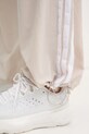 Tepláky adidas Essentials JC8168 béžová