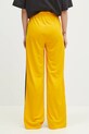 Odzież adidas Originals spodnie dresowe Firebird JP2316 żółty