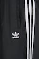 Tepláky adidas Originals OVERSIZED TP černá JD3390