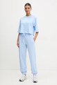 Bavlnené tepláky adidas ALL SZN JD4723 modrá SS25