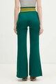 Odzież adidas Originals spodnie dresowe FLARED PANTS JC7689 zielony