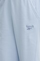 Бавовняні спортивні штани Reebok Classic блакитний 100221444