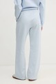 Bavlnené tepláky Tommy Hilfiger WW0WW44678 modrá SS25