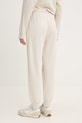 Ρούχα Παντελόνι φόρμας Puma Essential Logo 682459 μπεζ
