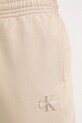 Calvin Klein Jeans spodnie dresowe beżowy LV047B235G