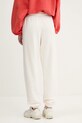 Abbigliamento Tommy Jeans pantaloni tuta di cotone DW0DW20670 beige