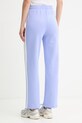 Odzież Puma spodnie dresowe 629797 niebieski