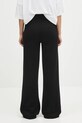Дрехи Панталон с вълна Palm Angels Palms Knit PWHG035S25KNI0011003 черен