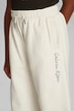 Детские спортивные штаны Calvin Klein Jeans IG0IG02876.128.176.PPYA бежевый