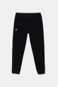 Dječji donji dio trenirke Under Armour Rival Woven Jogger s elastinom crna 1384207