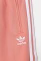 Otroški spodnji del trenirke adidas Originals roza JD1634