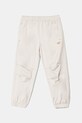 Дитячі спортивні штани adidas Originals JC9073 бежевий SS25