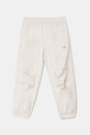 Dětské tepláky adidas Originals JC9073 béžová SS25