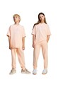 adidas Originals spodnie dresowe bawełniane dziecięce aplikacja pomarańczowy JC9143