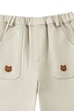 Otroške bombažne hlače Donsje Kassim Trousers Bear bež 4096301.98.128