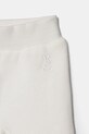 Chłopiec United Colors of Benetton spodnie dresowe bawełniane niemowlęce 3J70AF01R.W.Reproposed biały
