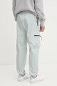 Одяг Спортивні штани adidas City Escape JF3286 зелений