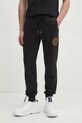 Бавовняні спортивні штани Versace Jeans Couture аплікація чорний 78GAAT00.CF01T