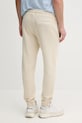 Odzież Calvin Klein Jeans spodnie dresowe bawełniane J30J327252 beżowy