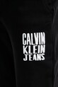 Bavlněné tepláky Calvin Klein Jeans černá J30J327535