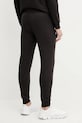 Odzież Puma spodnie dresowe 684652 czarny