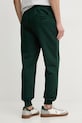 Odzież Tommy Hilfiger spodnie dresowe męskie bawełniane MW0MW37236 zielony